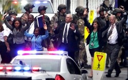 Slave Nation: Civilian employees at the Washington Navy Yard are frog-marched out of a building with their hands up following the mass shooting in Washington, D.C. on September 16, 2013